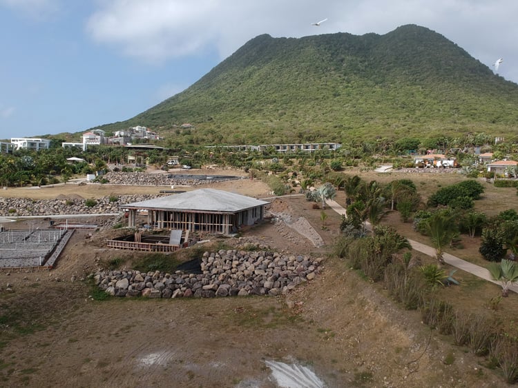 Sea Feather Estate under construction, with Golden Rock Resort and the Quill behind it